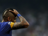 Juventus' Chilean midfielder Arturo Vidal laments a missed opportunity during the Champions League 2014/15 semifinals second leg  match betw...