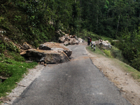 Due to land slide big stones are coming to the street which have occupying the transportation system in Sindhupalchawk, Nepal, 13 May 2015....