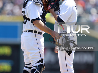 Detroit Tigers catcher Bryan Holaday talk to starter Anibal Sanchez during the fifth inning  of a baseball game against the Minnesota Twins...