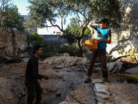 With simple tools, a man displaced from Damascus, Syria, on June 12, 2020, exploits a truce agreement in northwestern Syria. By digging an u...