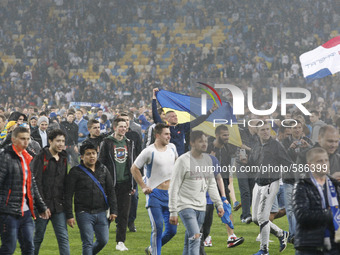 Dnipro fans celebrate after the UEFA Europa League, semi-final, second leg, soccer match between Dnipro and Napoli at the Olimpiyskyi stadiu...