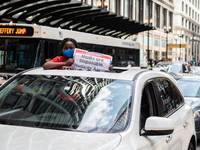 Chicago Teachers Union members and supporters join a car caravan outside Chicago Public Schools (CPS) headquarters while a Chicago Board of...