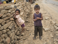 SINDHUPALCHOK, NEPAL-- May 15, 2015-- Children by the roadside in the village of Harre Dada in the severely earthquake affected region of Si...