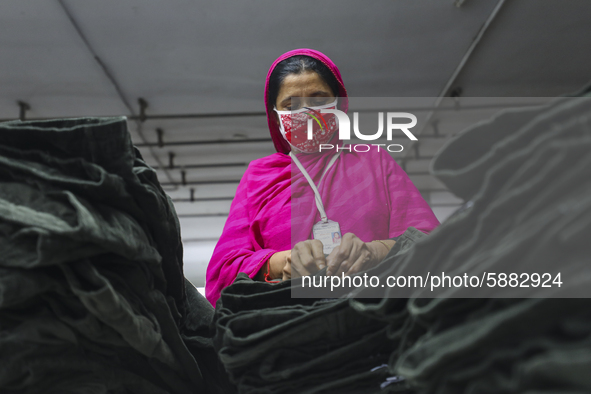 Ready made garments worker works in a garments factory in Dhaka on July 25, 2020. 