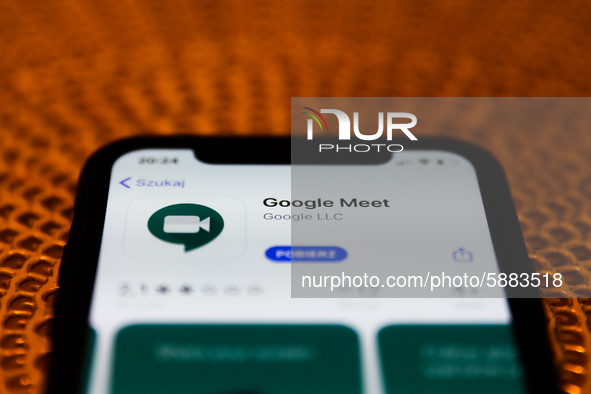 Google Meet icon is seen displayed on phone screen in this illustration photo taken in Poland on July 26, 2020. Video meeting apps gained po...