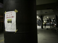 March 16, 2011-Sendai, Japan-Who posted find family poster near station pillar in Sendai on March 16, 2011, Japan. On 11 March 2011, an eart...