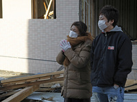 March 17, 2011-Sanriku Minami, Japan-Native Survivors searching their family at Tsunami hit Destroyed city in Sanriku Minami, north east of...