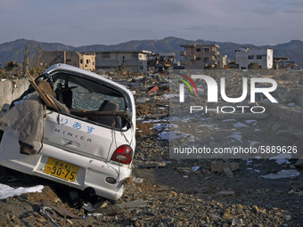 March 17, 2011-Sanriku Minami, Japan-Mini Car destroyed fill in debris at Tsunami hit Destroyed city in Sanriku Minami, north east of Tokyo...