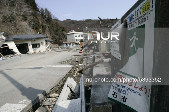 March 25, 2011-Kamaishi, Japan-A View of debris and mud covered at Tsunami hit Destroyed mine town in Kamaishi on March 25, 2011, Japan.  On...