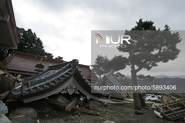 March 25, 2011-Kojirahama, Japan-A View of collapse shrine on mud covered at Tsunami hit Destroyed fishing village in Kojirahama on March 25...