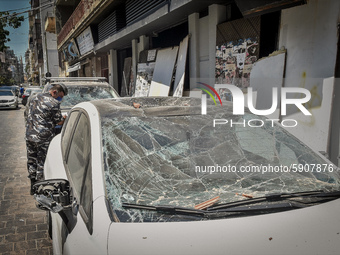 A damaged car is seen the day after a massive explosion at the port on August 5, 2020 in Beirut, Lebanon. According to the Lebanese Red Cros...
