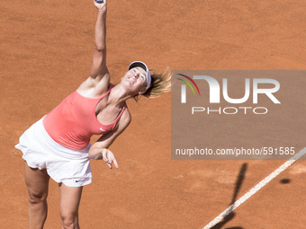 Maria Sharapova of Russia celebrates after winning the women's final match against Carla Suarez Navarro of Spain during at the WTA Tennis Op...