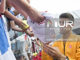 Novak Djokovic signs autographs and greets fans after his fourth victory of the Internationali of Rome (