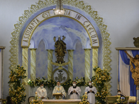 Priests and seminarians officiate the mass in the church of the Assumption in zone 2 of Guatemala City, on August 15, 2020, in honor of the...