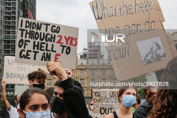 Youth protests at Parliament square against a new exam rating system which has been introduced in British education system - London, England...