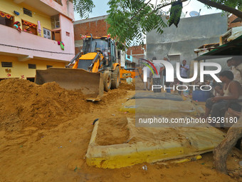  Vehicles submerged in mud as landslide brought in sand to low laying areas after the heavy rainfall at Sundar Nagar Ganesh Vihar colony,Lal...