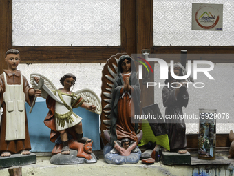 Religious wood art for sale in La Moreria Santo Tomas, for the procession in honor of Santo Tomás on Sunday, August 16, 2020 in the municipa...