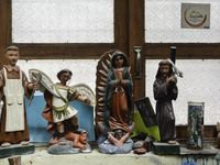 Religious wood art for sale in La Moreria Santo Tomas, for the procession in honor of Santo Tomás on Sunday, August 16, 2020 in the municipa...