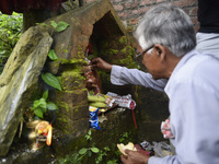 Nepalese devotees offering rituals towards an idol statue of Bagh Bhairab, due to the covid-19 pandemic, less number of Nepalese devotees ar...