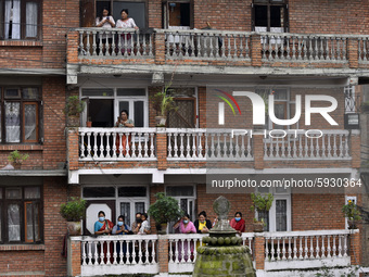 Nepalese devotee observing festival from the balcony, due to the covid-19 pandemic, less number of Nepalese devotees arrive to offer ritual...