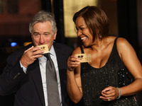 Pasay City, Philippines - Actor Robert De Niro (L) with wife, Grace Hightower De Niro (R) drink sake during the opening of Nobu Hotel in Pas...