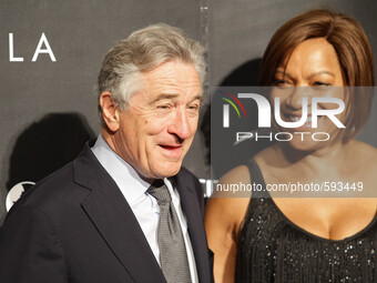 Pasay City, Philippines - Actor Robert De Niro (L) with wife, Grace Hightower De Niro (R) smiles to the media during the opening of Nobu Hot...