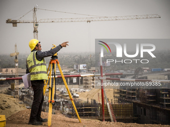 Workers in the site of the Grand Egyptian Museum, Giza, Egypt, 17 March 2014. The total cost of constructing the museum is 350 million dolla...