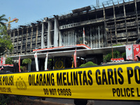 Firefighters erect the building after the fire at the Attorney General's Office building in Kebayoran Baru, Jakarta, on August 23,2020. The...