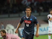 Manolo Gabbiadini celebrates after scoring of SSC Napoli during the italian Serie A football match between SSC Napoli and Cesena at San Paol...