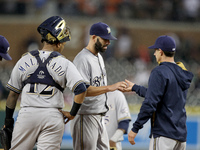 Milwaukee Brewers starter Mike Fiers is pulled by manager Craig Counsell during the sixth inning of a baseball game against the Detroit Tige...