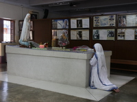 A Nun from the Catholic ,The Missionaries of Charity pray at the tomb of Mother Teresa to mark her 110th birth anniversary in Kolkata, India...