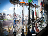 LEIDEN - A shop selling water pipes in the shape of the popular AK 47 automatic rifle is seen in the central part of the city. According to...