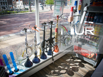LEIDEN - A shop selling water pipes in the shape of the popular AK 47 automatic rifle is seen in the central part of the city. According to...