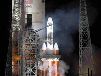 A United Launch Alliance Delta IV-Heavy rocket carrying a classified spy satellite for the National Reconnaissance Office is seen as the lau...