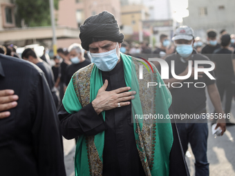 Citizens Bahraini Shiite Muslims participate in the revival of Ashura ceremony on 30 Augest 2020 in the village of Sanabis, south of the Bah...