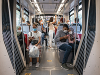 Turkish people wearing face masks went about their daily life routines in Istanbul, Turkey, on August 29, 2020,riding public transportation...