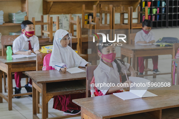 Students pay attention to the teacher at Candirejo Elementary School, Semarang Regency, Central Java, Indonesia, on September 1, 2020. Local...