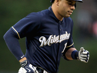 Milwaukee Brewers' Aramis Ramirez round the bases after his solo home run in the third inning of a baseball game against the Detroit Tigers...