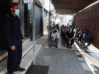 Palestinian employees Waiting their wages outside a bank of Palestine amid the ongoing coronavirus COVID-19 pandemic in Gaza City, September...