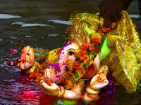 A Hindu Devotees immerse idols of the Hindu elephant god Ganesh during the Ganesh Chaturthi festival in Ajmer, Rajasthan, India on 01 Septem...