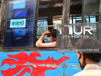 Passenger wearing face mask make their travels in a Bus during the coronavirus pandemic in Dhaka, Bangladesh, on September 1, 2020 (