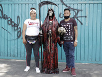 Dozens of followers of Santa Muerte, also known as ''Nina Blanca'', visited her temple located on Calle Alfareria, Tepito, Mexico, on Septem...