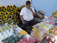 Merchants outside the temple of Santa Muerte in Tepito, also known as ''Nina Blanca'', to thank her for the favors granted during the pandem...