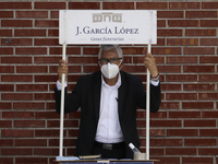 A stand manager outside the Jamaica Market in Mexico City, Mexico, on September 3, 2020  offers funeral services during the COVID-19 health...