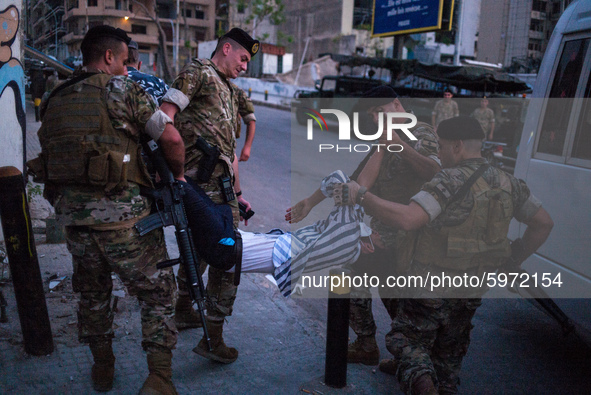 Soldiers arrest a man accused of stealing a cell phone at the memory gathering one month after the blast ,on September 3,2020,Beirut,Lebanon...