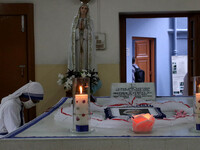 A Nun from the Catholic ,The Missionaries of Charity pray at the tomb of Mother Teresa to mark her 23rd Death Anniversary,The St. Teresa Dea...
