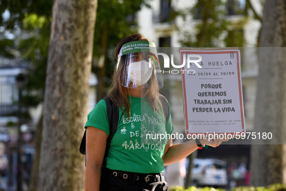 A protester hold a placard reading `On strike because we want to work without losing our livesin Madrid on 5th September, 2020. 