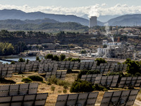 Images of the solar power plant, renewable electric power at Flix with the Ascó's nuclear power plant near Tarragona, Catalonia, Spain, on 4...