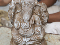 Freshly cast clay idol of Lord Ganesha (Lord Ganesh) at a workshop during the festival of Ganesh Chaturthi in Pondicherry (Puducherry), Tami...