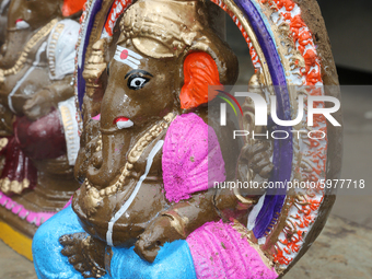 Freshly painted clay idols of Lord Ganesha (Lord Ganesh) are seen during the festival of Ganesh Chaturthi in Pondicherry (Puducherry), Tamil...